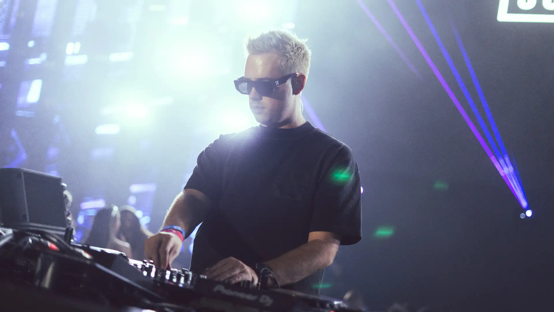 Scott Forshaw silhouetted in red stage lights at Terra Solis Dubai