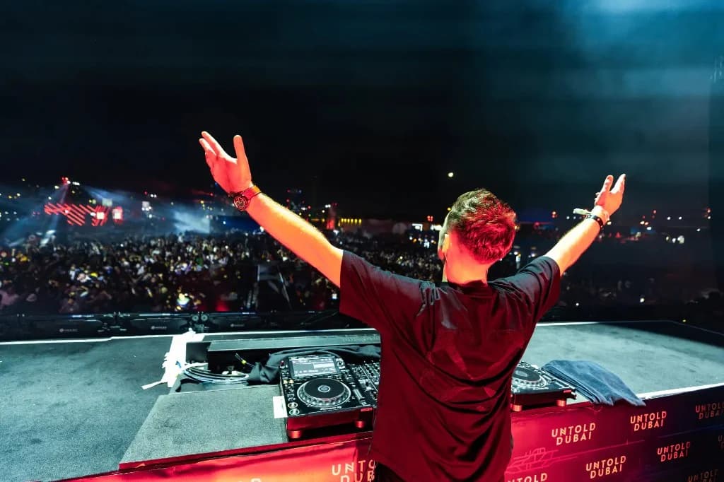 Scott Forshaw performing live at Ministry of Sound under purple stage lights
